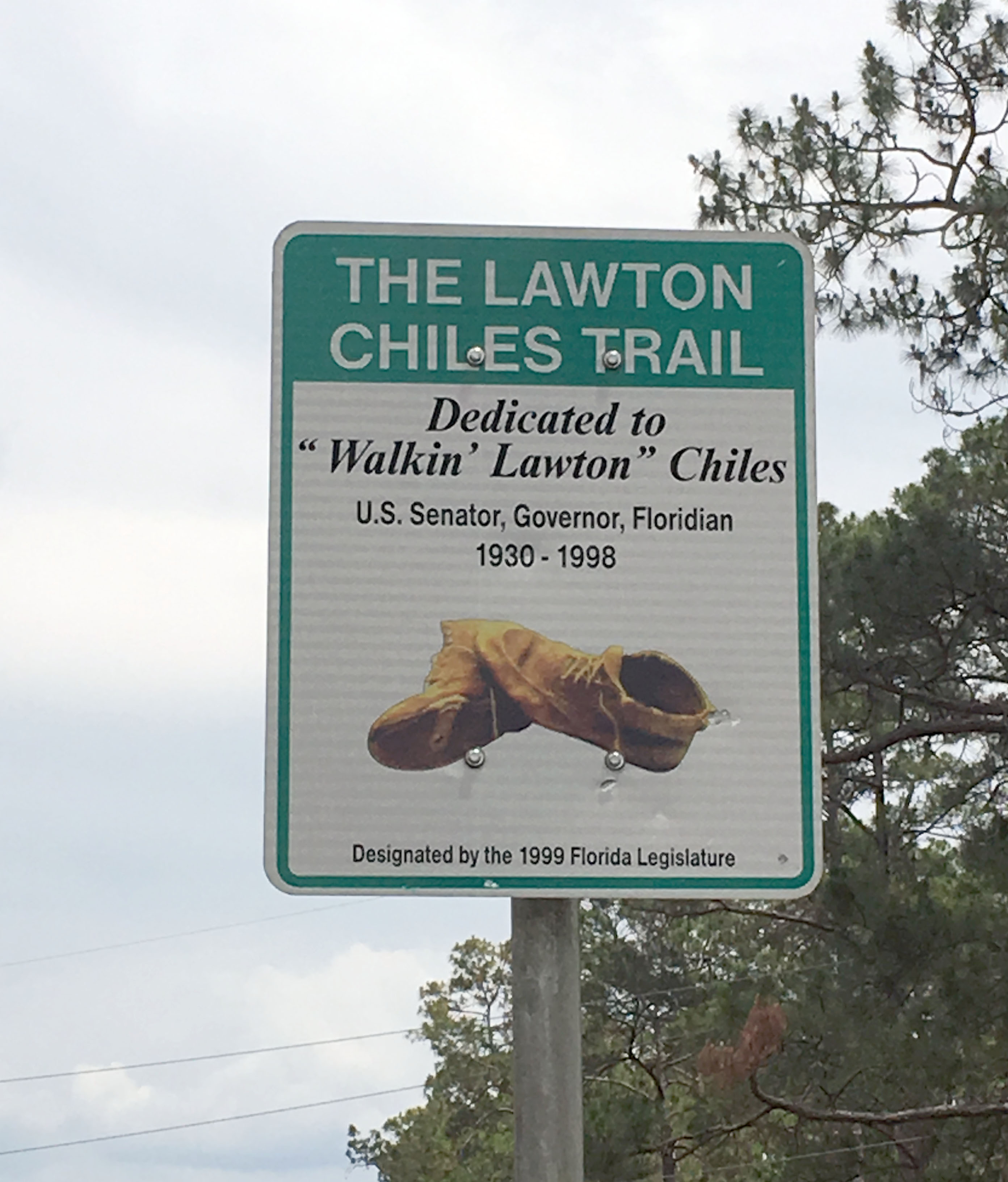 One of many signs marking the "Lawton Chiles Trail" designated by the 1999 Florida Legislature. This one appears on State Highway 100 just outside of Lake Butler (Photo courtesy of the author).