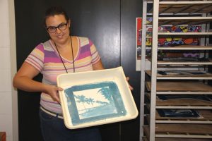 Jackie poses with freshly rinsed print.