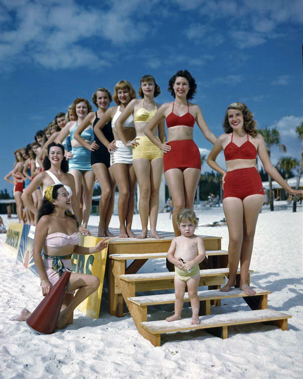 Sarasota Sun-Debs being given lessons in descending stairs at Lido Beach, Florida.