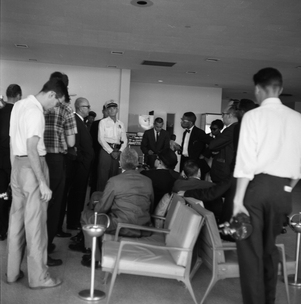 Rev. John Collier from Newark, N.J. (wearing bow tie), speaking with police as the 