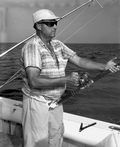 A fisherman fishing in the boat during the Shakespeare fishing trip - Panama City, Florida.