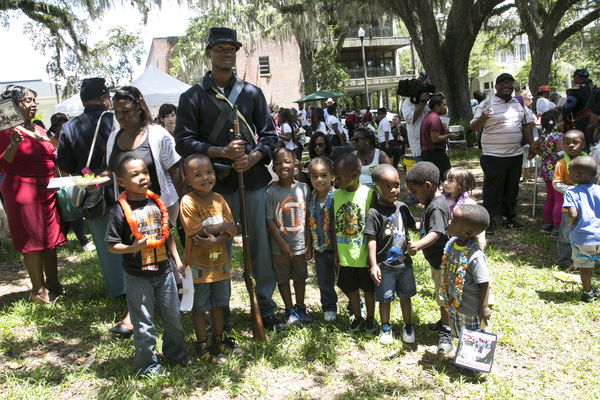 Union soldier reenactor with children during the 2015 Emancipation Day Celebration at the Knott House Museum in Tallahassee.