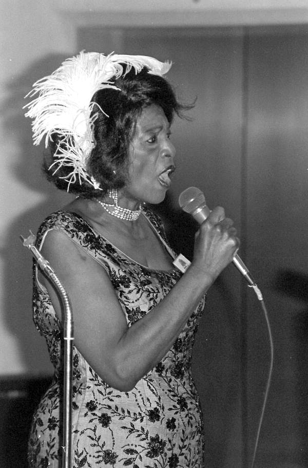 Blues musician Marie Buggs performs at the 1985 Folk Heritage Awards.