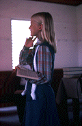 Girl singing from the Sacred Harp book at the Bethlehem Primitive Baptist Church - Old Chicora, Florida