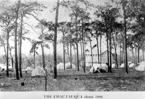 A chautauqua hall at Mount Dora, surrounded by the tents of families attending the show (circa 1886).