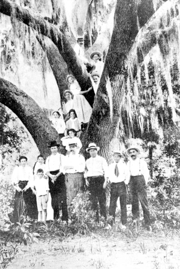 Men and women stand in and around Jacksonville's famous 