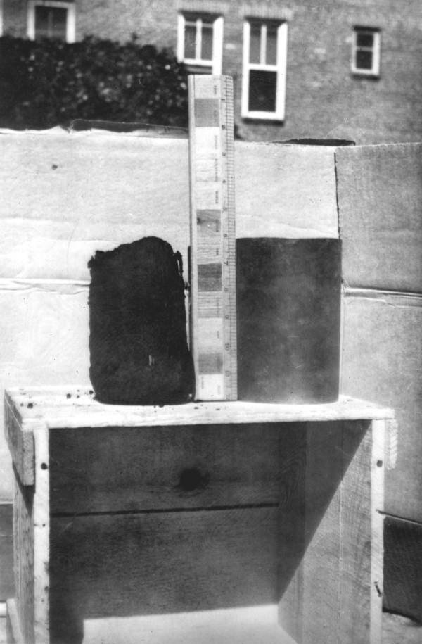 A core sample of peat taken by the Florida Geological Survey using the brass cylinder on the right. Peat can become dry and flammable, and some believed this explained the mysterious Wakulla Swamp Volcano (photo 1944).