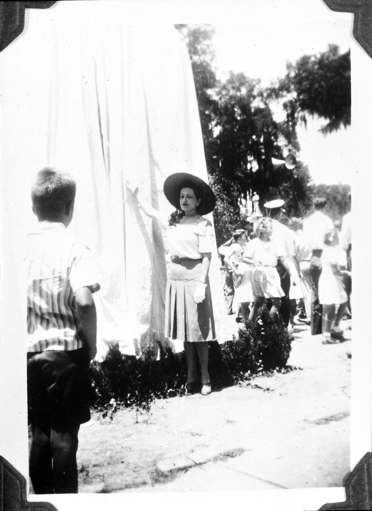 First Lady Mary Holland participates in the unveiling of a memorial to Colin P. Kelly, Jr. in Madison (June 16, 1944).