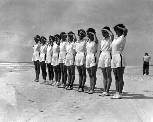 Young campers saluting at the FERA camp for unemployed women - Anastasia Island, Florida