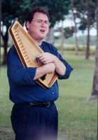 Jon Kay plays an autoharp: Fort George Island, Florida (2001)