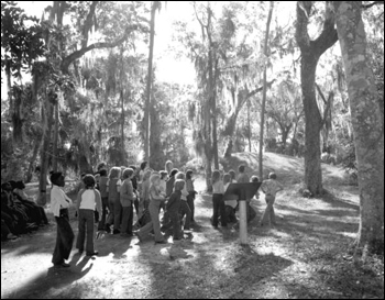 Visitors viewing the Indian mounds at Crystal River Archaeological State Park (1975)