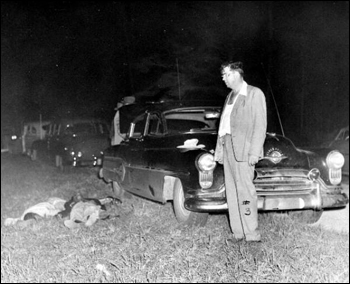 View of Sheriff McCall and shooting victims (1951)