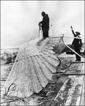 Ornithopter and creator George R. White at St. Augustine (1927)