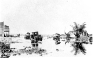 View of Avenue "A", flooded after the hurricane of 1928: Belle Glade, Florida