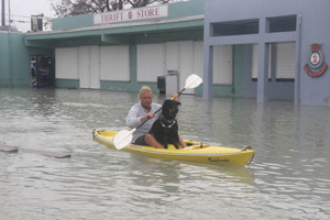 Man and his dog during Hurricane Wilma in Key West (2005)