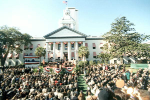 Crowd during inauguration ceremony on the east lawn of the Old Capitol (1999)