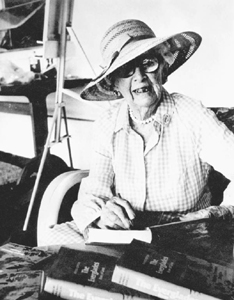 Marjorie Stoneman Douglas with her book, Everglades; River of Grass (1965)