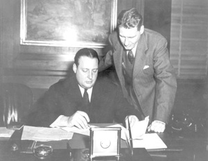 U.S. Secretary of the Interior J.A. Krug signing the papers to create the Everglades National Park (1947)