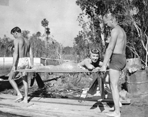 Ann Blyth being carried to underwater set during filming (1948)