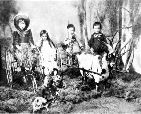 Dekle children with their toys (188-?)