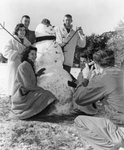 Florida State University students gathered around their snowman for a portrait: Tallahassee, Florida (1958)