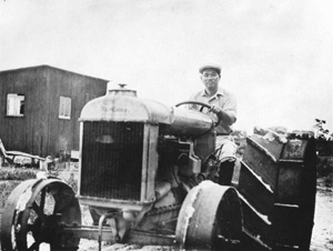 Hideo Kobayashi on tractor: Yamato, Florida (193-)