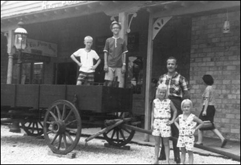 Charles Bloyd with his children during their visit to the Six Gun Territory tourist attraction: Ocala, Florida (1964)