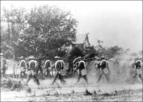 Company B of the 21st Infantry on a dusty march during the Spanish-American war (1898)