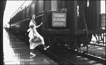 Unidentified woman boarding the Orange Blossom Special train: Sebring, Florida (ca. 1930)