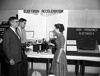 High school seniors gathered around exhibit at the Big Bend Science Fair in Tallahassee (1960)