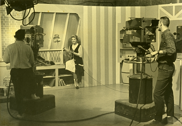 Nancy Benda working on the set of 