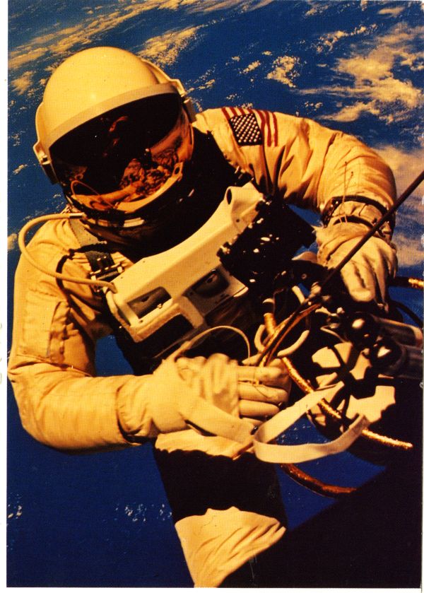 Astronaut Edward H. White II walking in space during the third orbit of the Gemini IV flight.