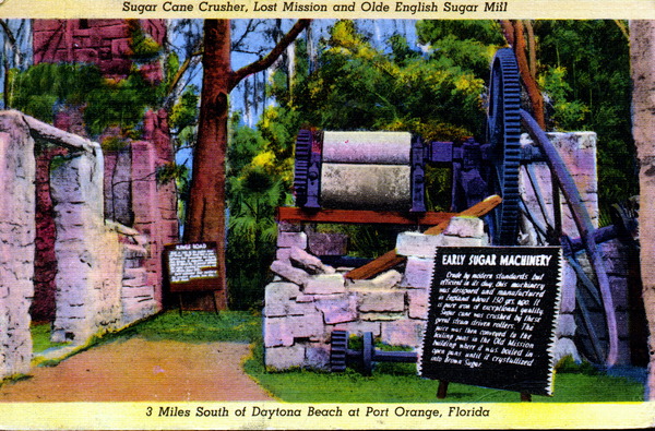 Postcard of Dunlawton Plantation with machinery and interpretive signage (circa 1940s).