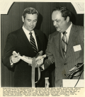 Governor Askew accepting jawbone during club meeting at the Silver Slipper restaurant in Tallahassee.