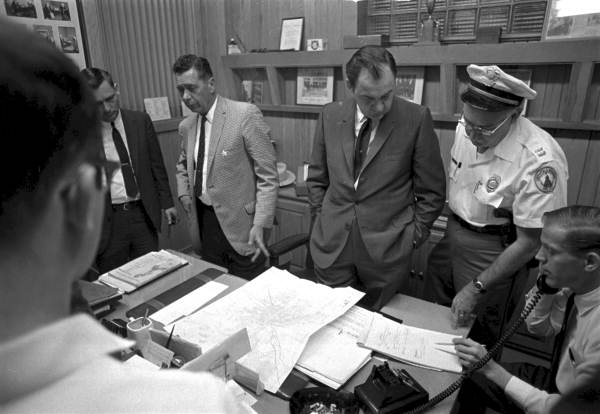 Governor Claude Kirk meets with state law enforcement officials to discuss a response to the unrest following Dr. Martin Luther King's assassination. 