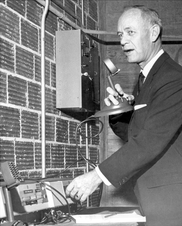 Governor C. Farris Bryant tests an emergency radio system located in the fallout shelter located in the basement of the governor's residence in Tallahassee. In the event of a nuclear attack, this shelter would have become Florida's seat of government, and the radio system would have enabled communication between the governor and the State Highway Patrol, the Road Department, and other state agencies. This photo was taken around the time of the Cuban Missile Crisis (October 1962).