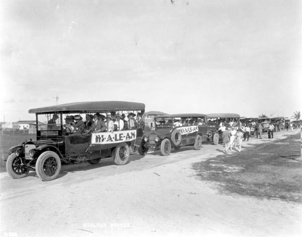 Busloads of potential home buyers make their way through the new suburban development at Hialeah (1921).