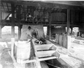 A worker making turpentine in the Wauchula Turpentine Still - Wauchula, Florida