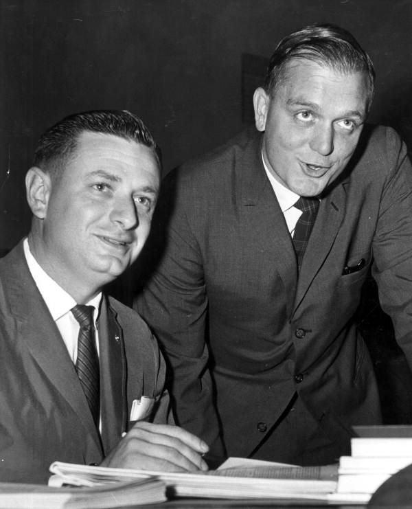 Representatives Don Fuqua (left) and Lawton Chiles (right) looking over a bill during the 1961 legislative session in Tallahassee.