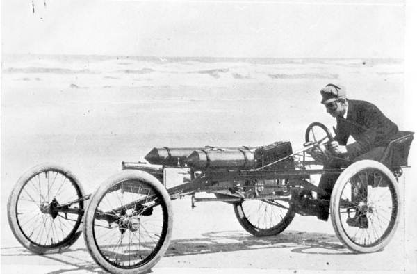 Ranson E. Olds in his Olds Pirate racecar on Ormond Beach (circa 1896).