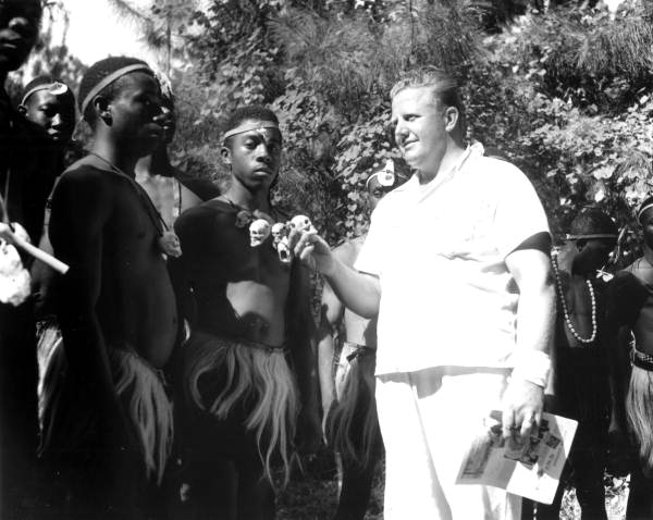 Manager Newt Perry with actors portraying Bantu warriors (1941).