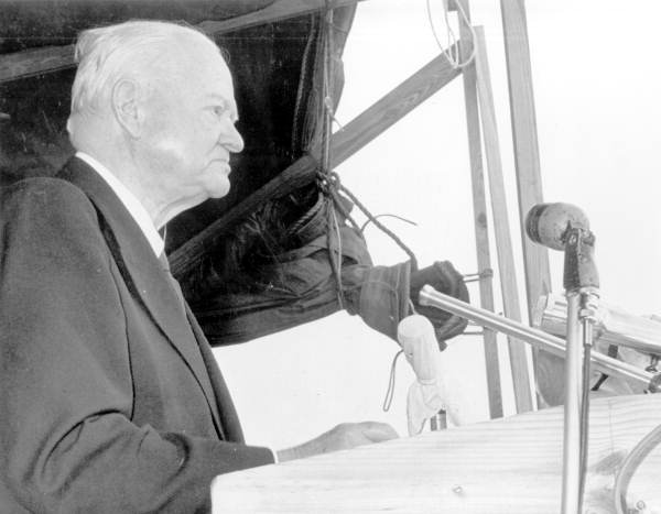 Former President Herbert Hoover addresses the crowd at a ceremony dedicating a new dike for Lake Okeechobee in his honor (1961).