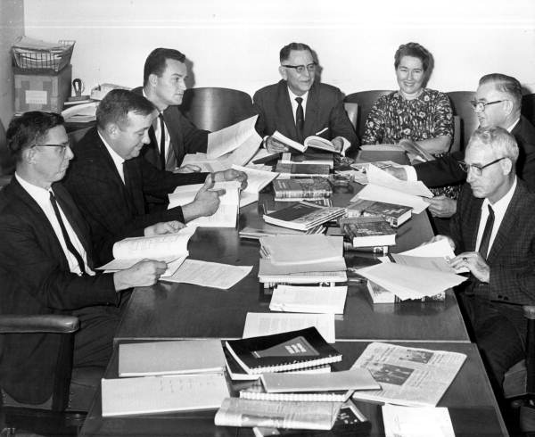 State textbook committee on secondary science examining proposed new biology books - Tallahassee, Florida.