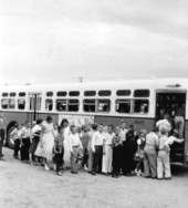 Children boarding bus for school - Saint Petersburg, Florida.