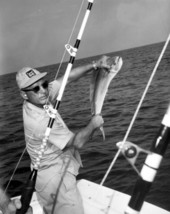 A fisherman holds up a mahi-mahi caught during the Shakespeare fishing trip - Panama City, Florida.