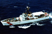 USCG cutter "Cape Strait" under way off Key West, Florida with Haitian refugees on board after intercepting them..