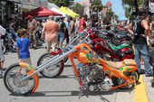 Custom motorcycles on Duval Street during the annual Poker Run - Key West, Florida.