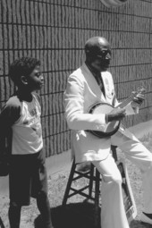 "Washboard Bill" Cooke playing a "banjo uke" at the Florida Folk Festival- White Springs, Florida