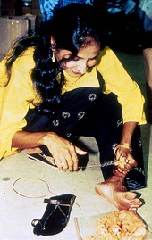 Pam Maneevatana making Thai fruit and vegetable carvings