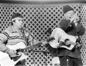 James E. Billie, left, and Will McLean performing at the 1986 Florida Folk Festival- White Springs, Florida.